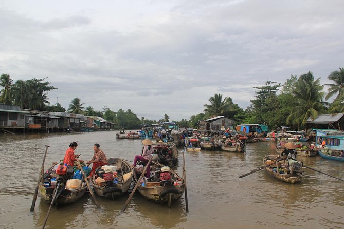 1-day Mekong Delta Tour: Cai Be Market, Local Island and Cycling - Cycling Through Orchards: The Best Kind of Effort