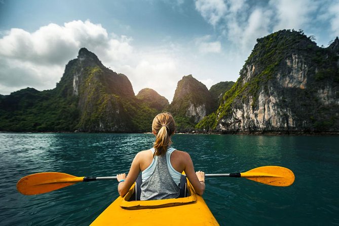 7 Days Package in Vietnam - Day 4: Ha Long Bay cruise day with kayaking, swimming, and squid fishing
