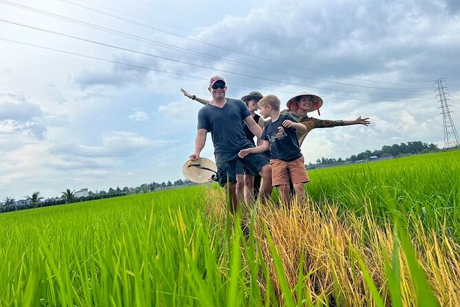 Cu chi Tunnel & Mekong Delta Full Day BBQ Lunch Lux Group 10 pax - Coconut candy factory and floating-house fishing views