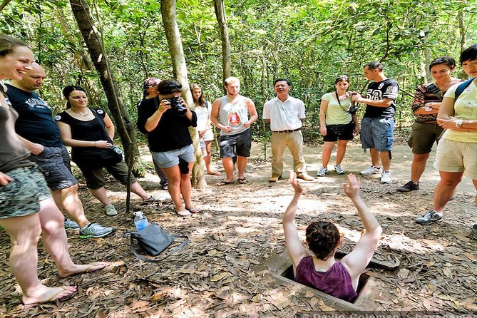 Cu Chi Tunnels and Mekong Delta Full Day - Entering the Củ Chi tunnel complex: how the site teaches, not just shows