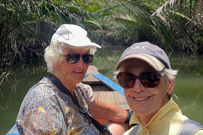 Cu Chi Tunnels History & Mekong Delta Culture River Cruise Tour - My Tho by sampan and coconut island: canals, music, fruit