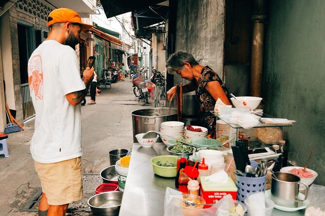 Early Riser Walk: Grandma Noodles, Cafe, Exotic Fruits & History - Bàn Cờ Market: deeper neighborhood energy, less performance