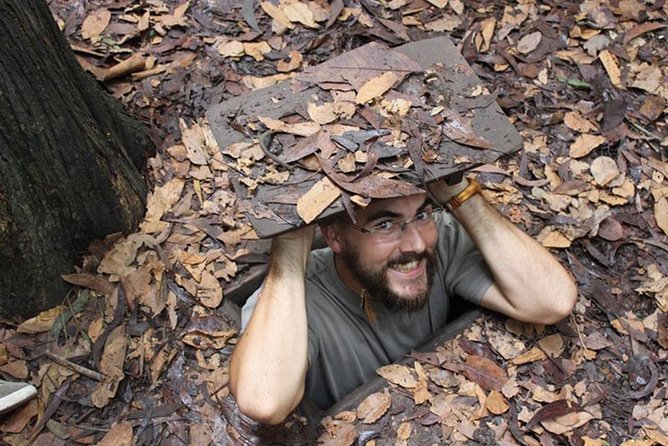 Explore Cu Chi Tunnels & Saigon History 1 Day Tour - Cu Chi Tunnels: Booby Traps, Crawling, a Touchable Tank, and Viet Cong Food