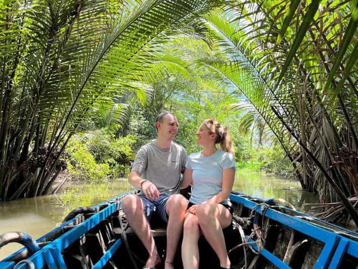 From Ho Chi Minh City: Visit Mekong Delta & Ben Tre In 1 Day - Vinh Trang Pagoda in My Tho: giant Buddha statues and cross-cultural design