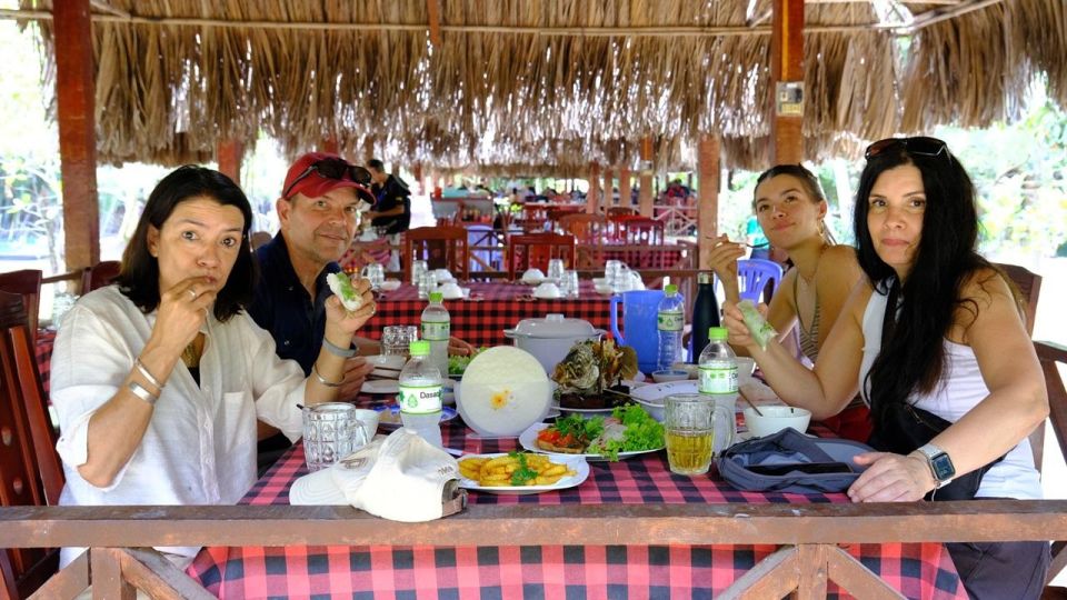 From Ho Chi Minh: Explore Vietnam's Rural Mekong Delta - Rowing Canals and Tuk-Tuk Streets (Plus a Python Farm Stop)
