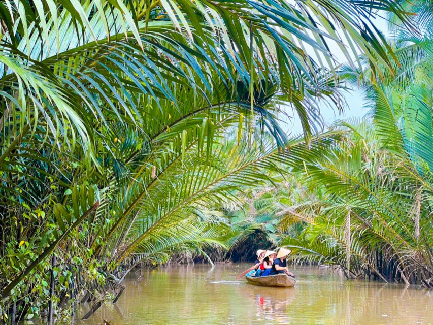From Ho Chi Minh: Explore Vietnam's Rural Mekong Delta - Riding the Mekong River: Fishermen, Waves, and Coconut Water