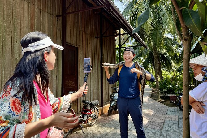 Full Day Guided Mekong Delta Day Tour in Vietnam (Multilingual) - Group size and the Multilingual guide: expect a big day, not a private one