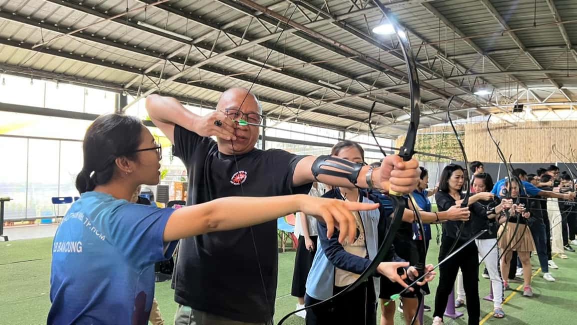 Ho Chi Minh City: Archery and Hidden Café Experience - Instructor and photo moments: the fun part between shots and coffee
