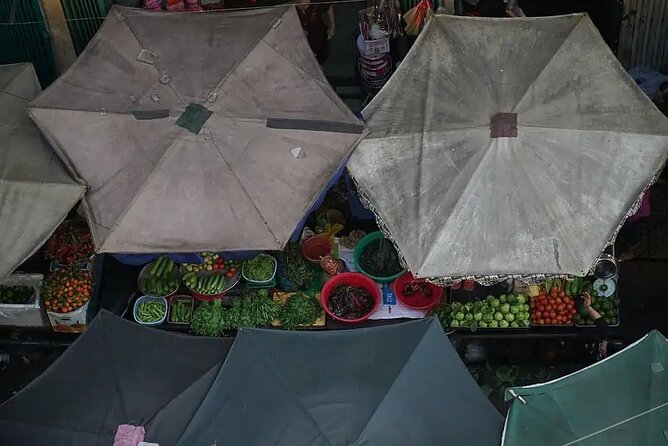 Ho Chi Minh City: Chinatown Hidden Treasures – Free Walking Tour - Stop 4: Chợ Lớn Commercial District and the Chinatown Reality Check
