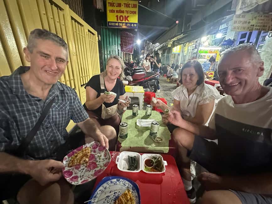 Ho Chi Minh City: Guided Food Tour by Scooter - Scooter Pickup in District 1: Eating on Wheels Across Four Districts