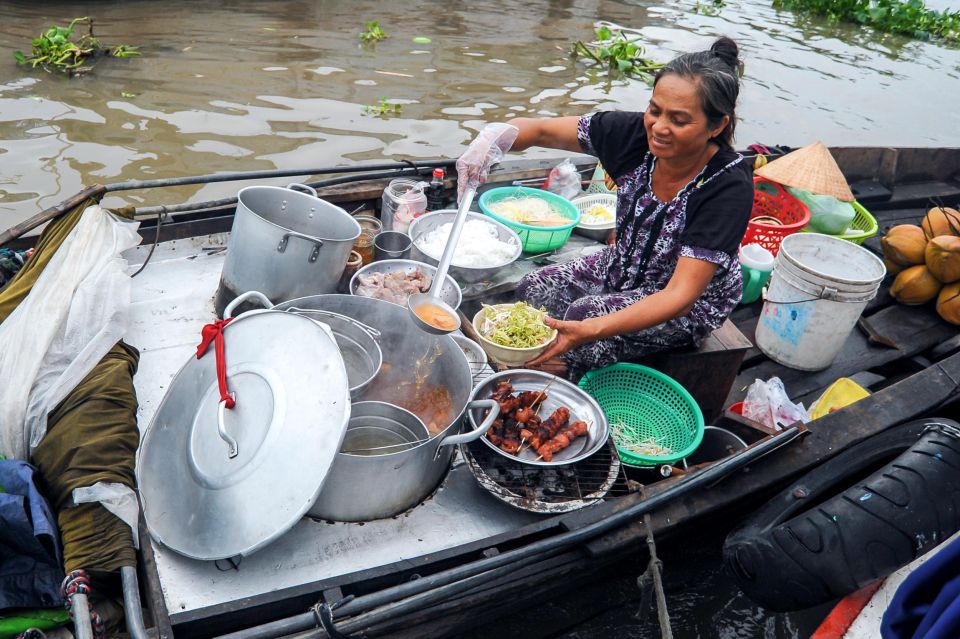 Ho Chi Minh City: Mekong River Delta Day Trip with Boat Trip - Mr. Kiet’s ancient house: old wood, careful craft, real atmosphere