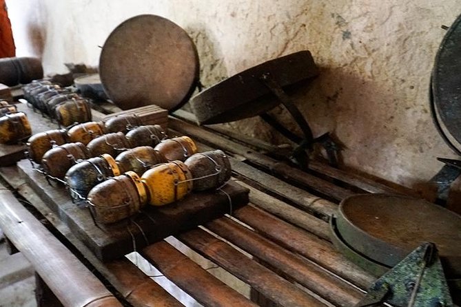 Ho Chi Minh City Saigon and Cu Chi Tunnels Private Tour Full Day - Cu Chi Tunnels: guided learning, crawl time, cassava, and optional firearms