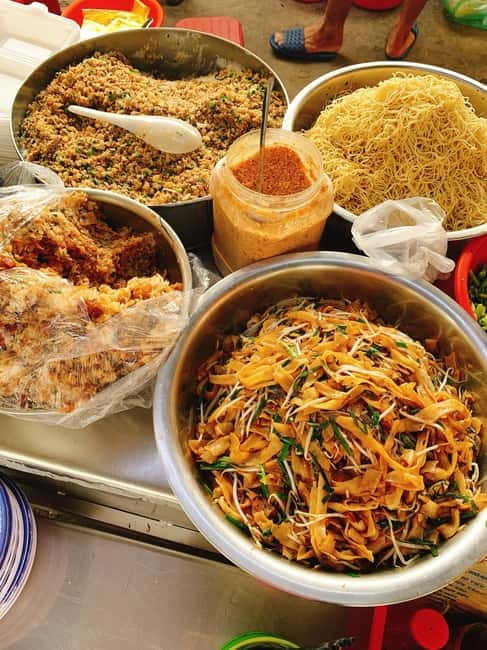 Ho Chi Minh City: Xom Cai Hidden Local Life Walking Tour - Hoa Binh Market: how locals shop, snack, and move through the day