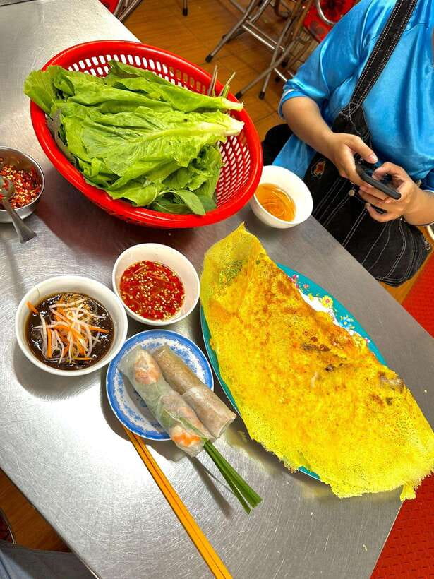 KISSTOUR | Motorbike Food Tour Female Drivers in Ho Chi Minh - Stop 2: crepes and betel-leaf beef for a big texture shift