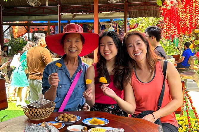 Private Scooter Street Food Tour in Saigon with 11 Tastings - District 10 flower market dessert and the Ong Cay Bridge night view