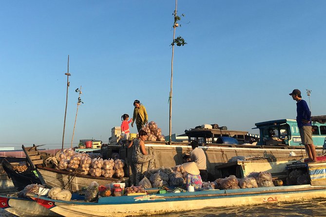 Private tour to Mekong Delta 1 day - Tan Phong: hand-rowing boat through narrow Mekong canals