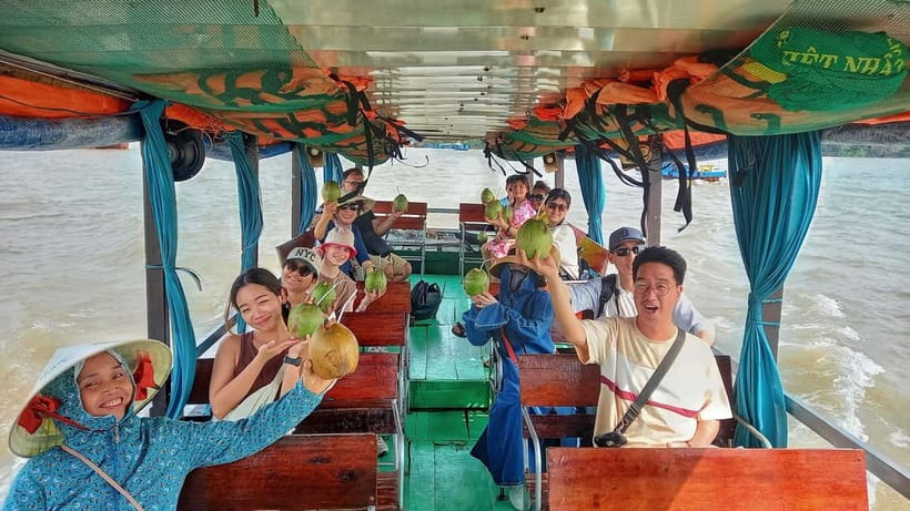 Private Vinh Trang Pagoda & Mekong Delta from Ho Chi Minh - Sampan Through Coconut Canals: Where the Mekong Slows Down