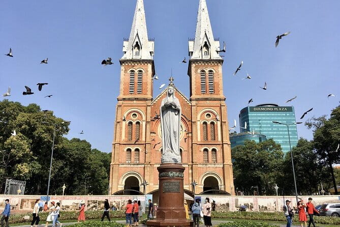 Sai Gon City Tour and Dinner On Cruise Half Day - The Saigon River Dinner Cruise: Food, Music, and City Lights