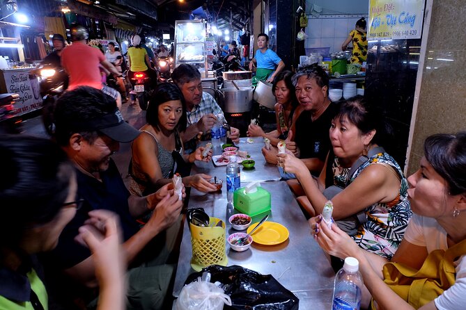 Saigon at Night Walking Street Food Tour - Rain Gear and Street Reality: Small Details, Big Difference