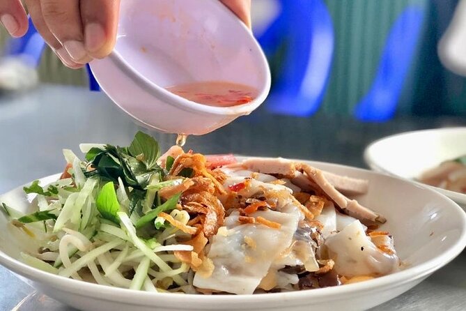 Saigon By Night: Authentic Street Food Scooter Adventure - Key highlights at a glance