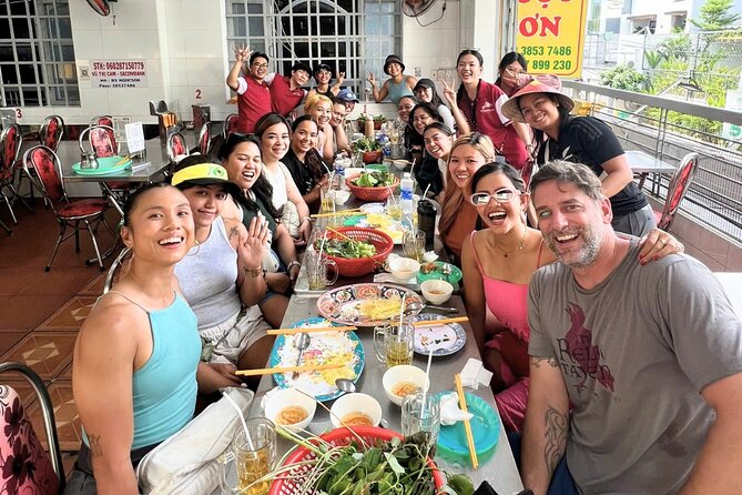 Saigon By Night: Authentic Street Food Scooter Adventure - Meet in District 1: Welcome Drink, Helmet, and a Real Safety Brief