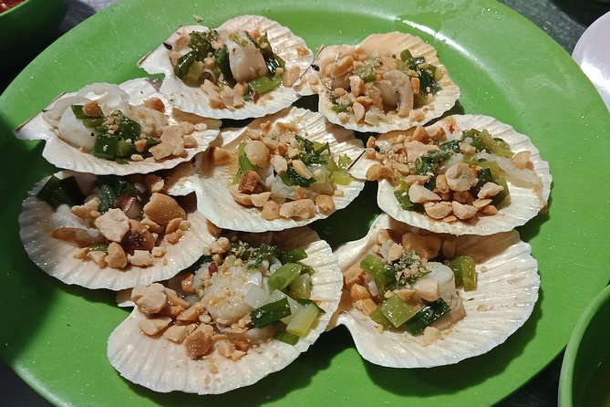 Saigon luxury food tour on motorbike with 10 authentic dishes - Ho Thi Ky Flower Market at night: a smart opener