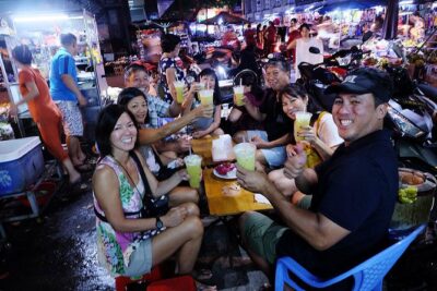 Saigon Night Sights & Local Food by Motorbike| Opt: Ao Dai Riders - Helmet, poncho, and the safety vibe you actually want