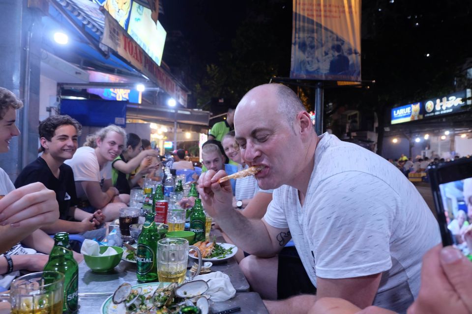 Saigon: Night Sightseeing And Street Food Tour By Vespa - Flower market + grilled rice paper with egg, shrimp, pork, and cheese