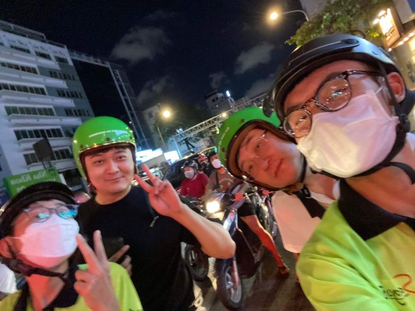 Saigon: Night Sightseeing And Street Food Tour By Vespa - District 4 legendary bread: ham, butter, pate, fish sauce, and coriander