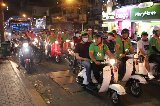 Saigon Vespa By Night Street Food Tour 4,5 Hours - Stop-by-stop: Ho Chi Minh Square to the music bar