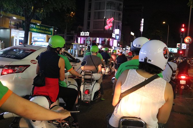 Saigon Vespa By Night Street Food Tour 4,5 Hours - The guide team: Hoang Vu, plus John, and the role of clear explanations
