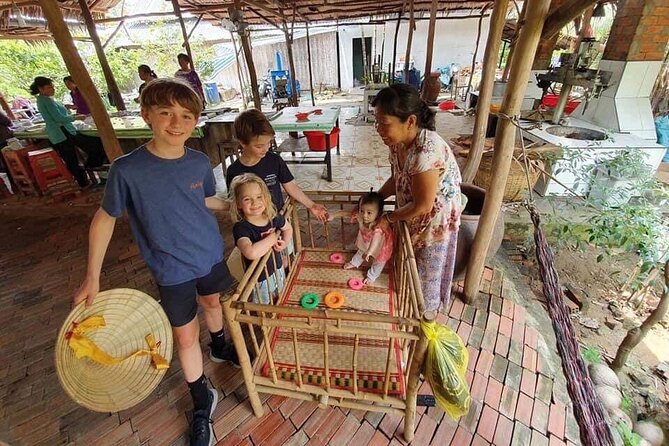 SMALL GROUP - Mekong Delta 1 Day Tour with Lunch - Vinh Trang Pagoda and the Tien River pause before the fun